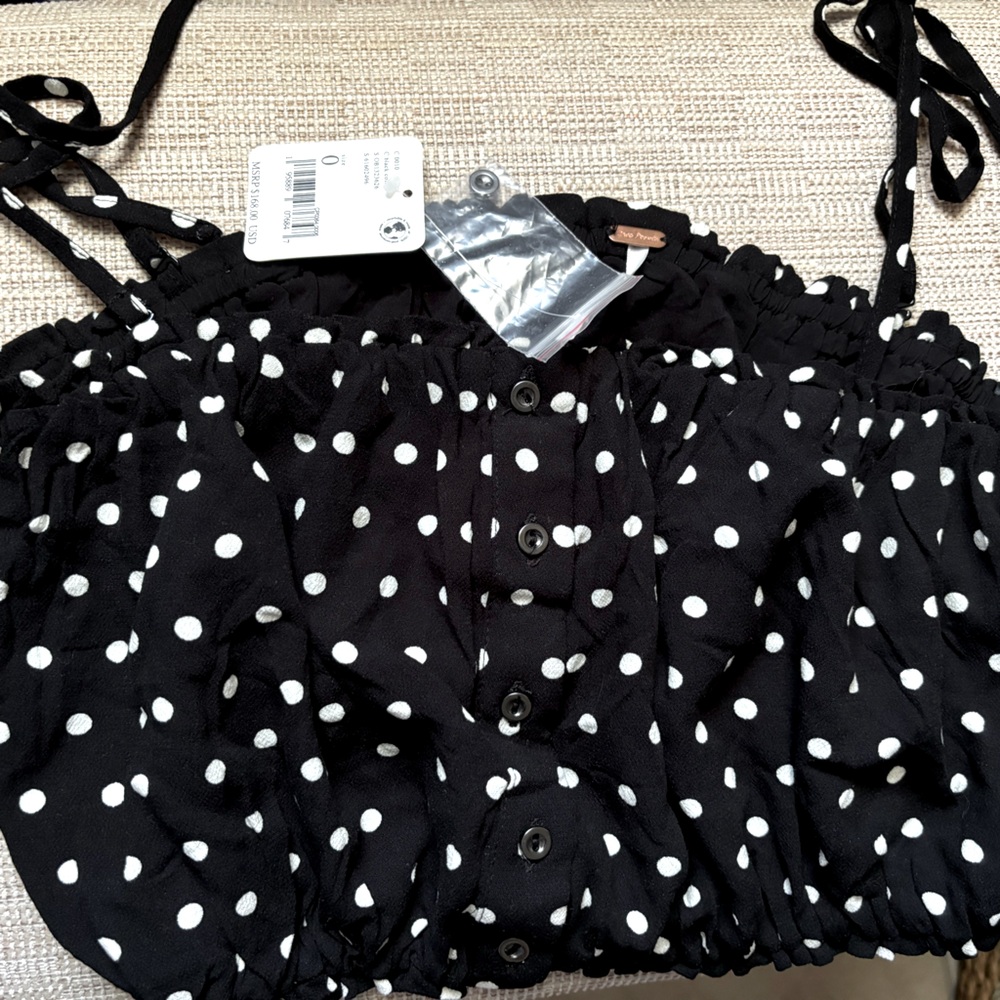 Free people Black & white polkadot tube top with straps. Excellent cond. w/tags.